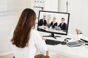 Businesswoman Attending Video Conference On Computer
